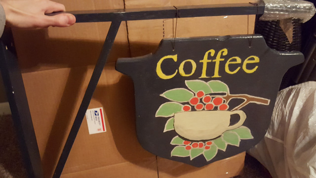 Coffee shop sign made of wood